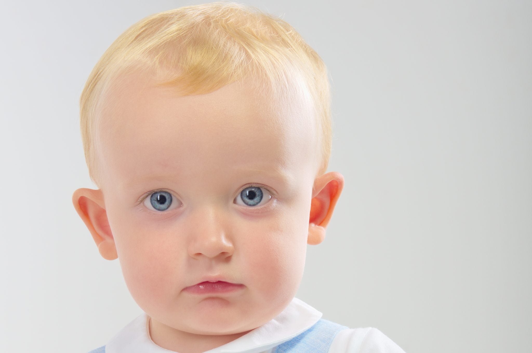 Blonde Baby With Blue Eyes