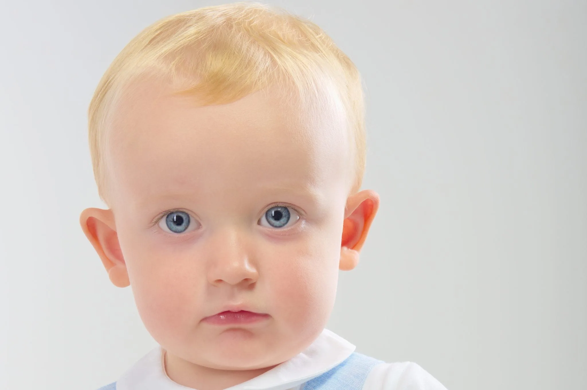 Blonde Baby With Blue Eyes